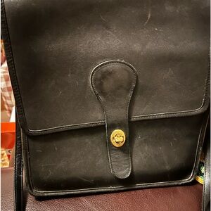 Black coach tags inside and out